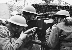 A Cheshire Home Guard Battalion during an exercise with 6 pounder gun