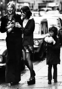 Street Traders Prints: A child selling paper flowers on the streets of Newcastle on 27th December 1974