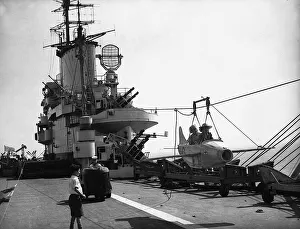 Fairground Rides Prints: Children aboard the aircraft carrier HMS Indomitable during the 1952 Navy Day