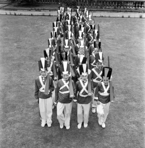 Children: Actors toy soldiers on parade: Toy soldiers painting whilst rehearsing at St