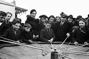 Stalls Prints: Children and adults playing a game at Blackheath Fair April 1938