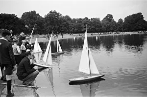 Hobbies Prints: Children and adults sailing their toy yachts on the Round Pond in Kensington Gardens