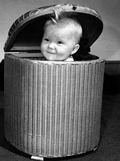 Cheeky Prints: Children - Babies Baby 8 month old Julie sitting in a straw basket