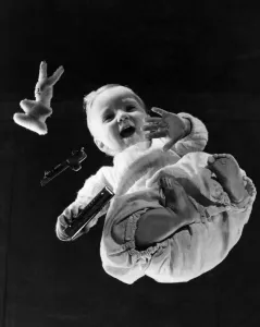 00334 Prints: Children Babies: (Picture was taken from underneath a specially constructed transparent