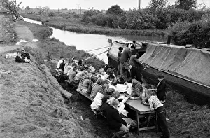 Schoolchildren Prints: Children of barge familys seen here being educated on the canal bank by a floating