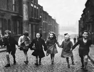 Holding Hands Prints: Children of Bengel Street holding hands as they walk up the terraced street from school