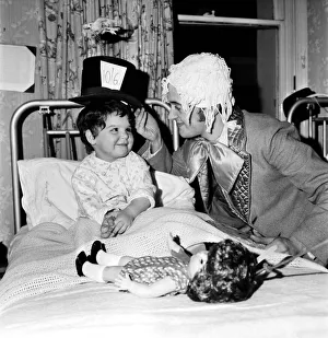 Children of Booth Hall Hospital meet character from Alice in Wonderland