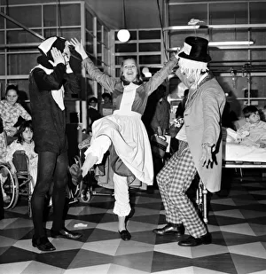 Children of Booth Hall Hospital meet character from Alice in Wonderland