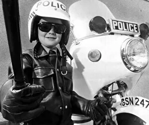 00140 Collection: Children - Boys Young Hugh Keith, dressed up as motor bike Police Patrolman