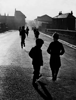 Scenic Prints: Children in Cardiffs dockland spin-out those last blissful moments before its time