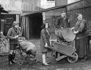 Children collecting their coal ration from a coal merchant near Birmingham City centre