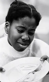 Plate Prints: Children: Eating and Drinking: Fish finger tester Erica Loley. October 1980