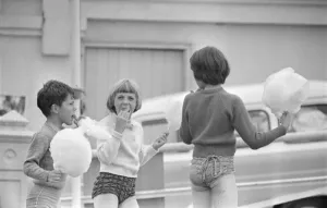 Sweets Prints: Children enjoying candyfloss from a stall on the seafront at Brighton July 1958