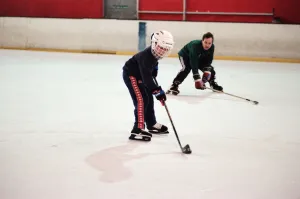 Children enjoying a game of ice hockey during half term at Billingham Forum