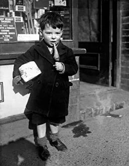 Children - Food - 1940s Young Boy standing outside a shop