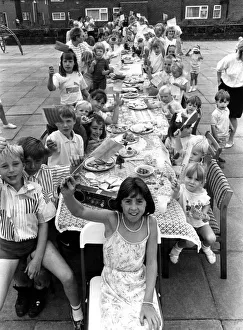 Bunting Prints: Children of Hareydene, Newcastle, enjoy a street party given for the birth of Princess