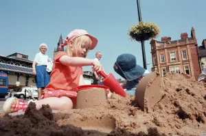 Children from Kids & Co. Nursery spend the morning playing with the sand in