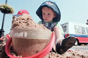 Children from Kids & Co. Nursery spend the morning playing with the sand in