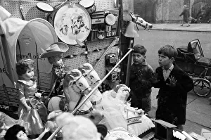 00488 Prints: Children look longingly at toys into shop window at Christmas, 16th December 1960