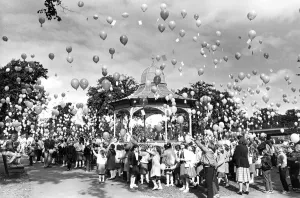 Children from Newbiggin Hall Estate in the West End of Newcastle set balloons flying