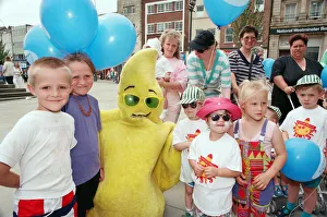 Mascot Prints: Children and parents who took part in the sponsored toddle to launch the Health