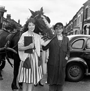 Children petition to save milkmans house: Jennifer here collects a signature in a street