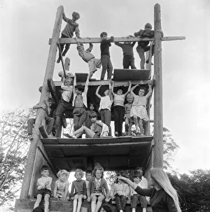 Balance Prints: Children playing on climbing frames at the adventure playground in Moulsecomb, Brighton