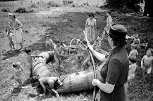 00017 Prints: Children playing in a paddling pool at Hollyshaw Residential Nursery June. 1950 O24480