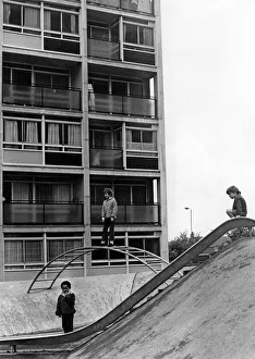 High Rise Prints: Children playing on play equipment on land between flats at Hillfields, Coventry