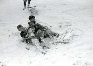 Children playing in the snow after a heavy fall at Hampstead Heath January 1945
