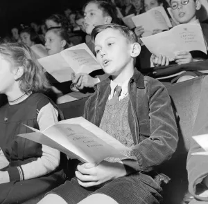 00192 Prints: Children rehearse for the Carol Festival at the Central Hall Westminster December