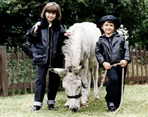 Donkey Prints: Two children Samantha and Aaron modelling clothes for Mirror Fashion Article