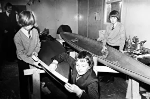 01509 Prints: Children at Sarah Metcalfe School build a canoe in Wood shop class, Middlesbrough