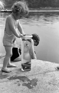 Children seen here with their days catch in a jar on the banks of the River Lea