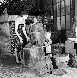 Pottery Prints: Children seen here playing with clay at David Rawnsleys Chelsea Studio