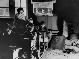 Studying Prints: Children sitting at their desks in their school classroom on the Isle of Lewis in