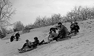 Sledge Prints: Children sledging in Stoke Park, Bristol 31st December 1961