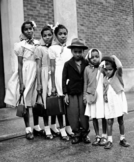 The children of the Templeton family seen here arriving in the United Kingdom