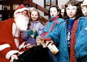 Presents Prints: Children turned the tables on Santa at the Billingham Forum - taking gifts to him