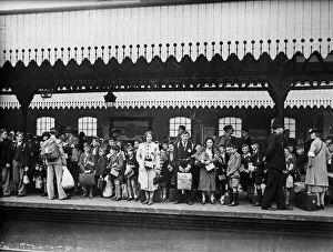 Children wait on the platform of East Ham railway station waiting for evacuation to