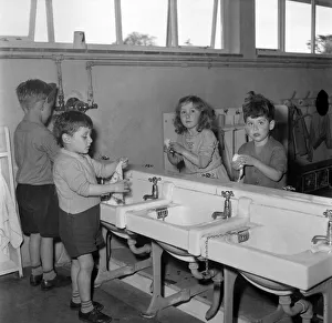 Children washing their hands before class at Cookham Nursery School