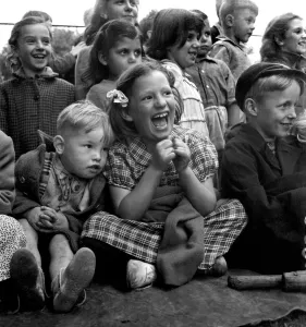 Children Watching Punch and Judy in the Arch Bishops Park in London