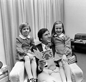 00089 Prints: Childrens book writer Roger Hargreaves reading one of his stories to his twins