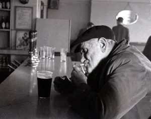 The Chimes Lansbury Public House Pub - 1953 A old man sits at the bar with a pint