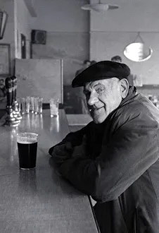 The Chimes Lansbury Public House Pub - 1953 A old man sits at the bar with a pint