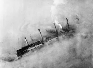 Chimneys of an East End factory poke through the blanket of smog covering London