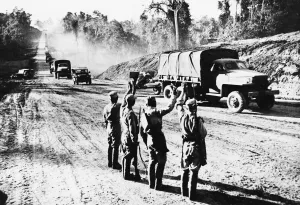 01455 Prints: Chinese soldiers on the Stillwell road in Myitkyina during Second World War wave to
