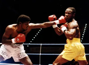 Chris Eubank Boxer takes a left jab from his opponent during their fight in Birmingham