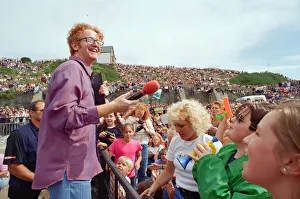 Chris Evans, DJ on Radio One, presents the Radio One Roadshow from Tenby in South Wales