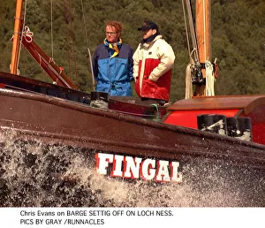 Chris Evans Radio one dj and tv presenter on a barge with a unknown male on Loch Ness